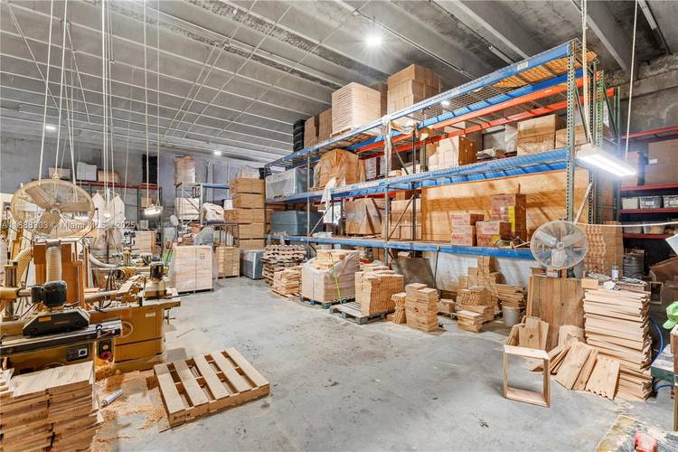 Rarely available 6, 121 SF corner warehouse condo perfect for owner user or investment.