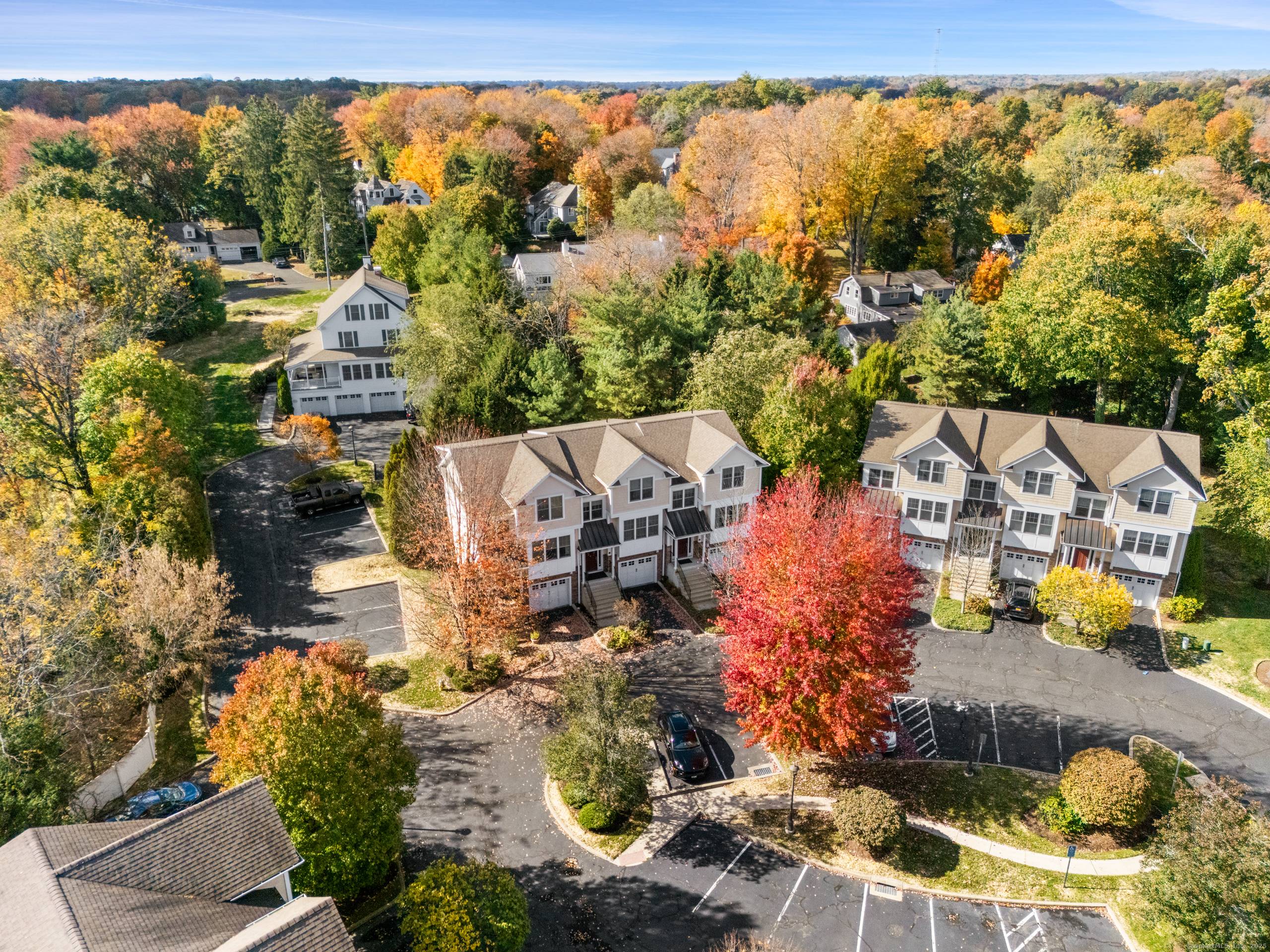 Nestled in a private gated enclave, this sophisticated Westport townhouse blends timeless elegance with modern comfort.