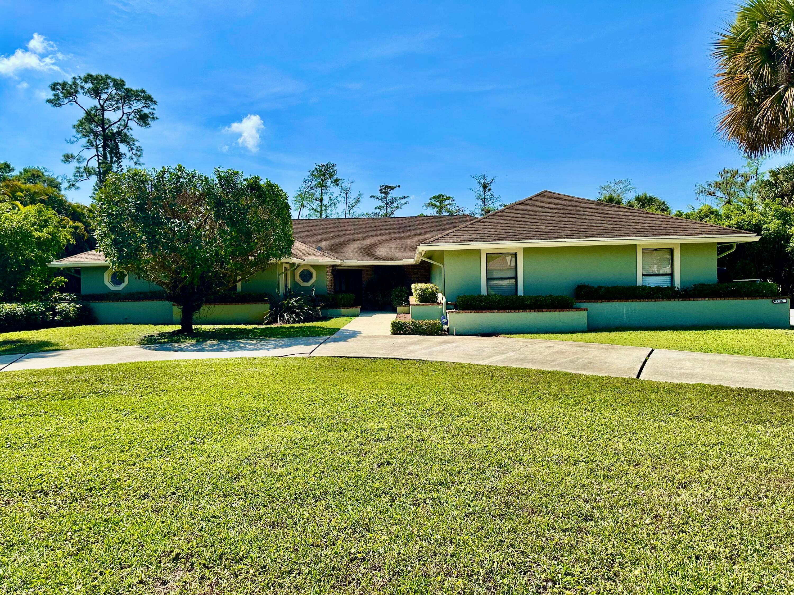 Welcome Home ! This 1. 23 acre estate features 4 Bedrooms, 3 Bathrooms 2 Powder Rooms, 3 Car Garage.