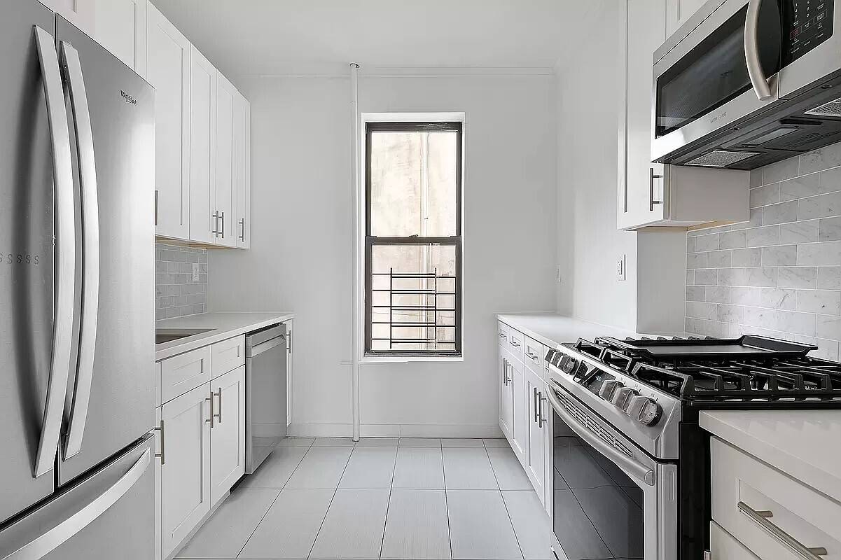 Step into this spacious 3 bedroom, 2 bathroom gem that s been lovingly renovated, boasting a modern kitchen and baths, in home laundry, and nearly 40 feet of frontage along ...