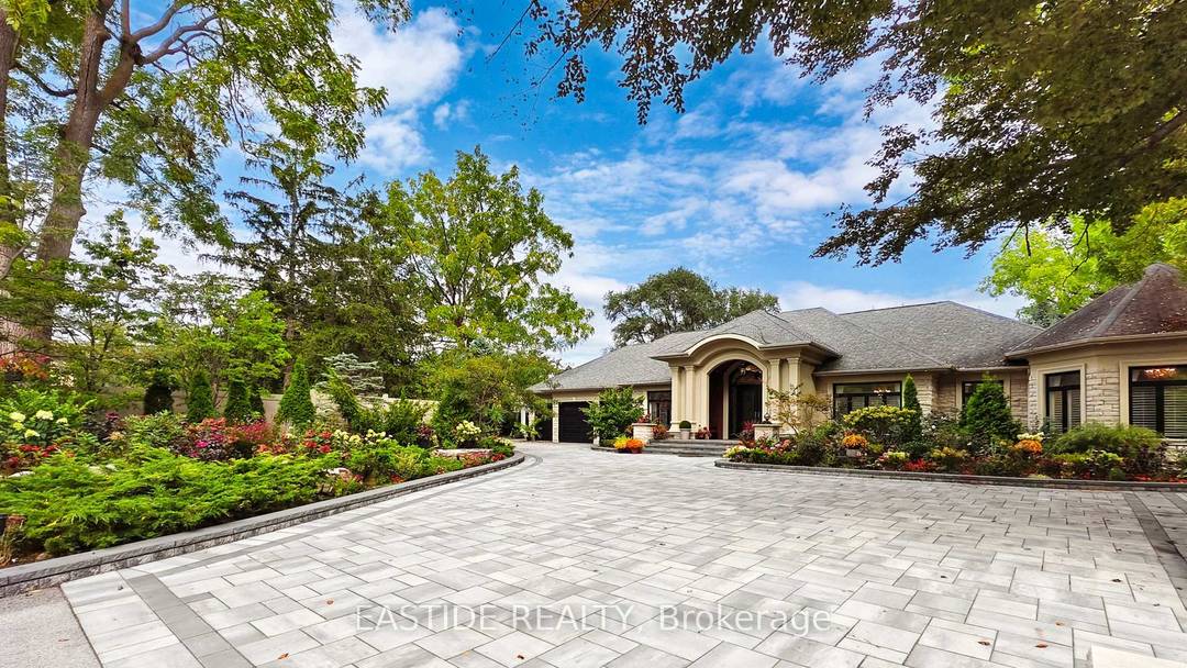 Welcome to 431 Fourth Line a once in a lifetime opportunity to own a palatial custom built bungalow on a sprawling 0.