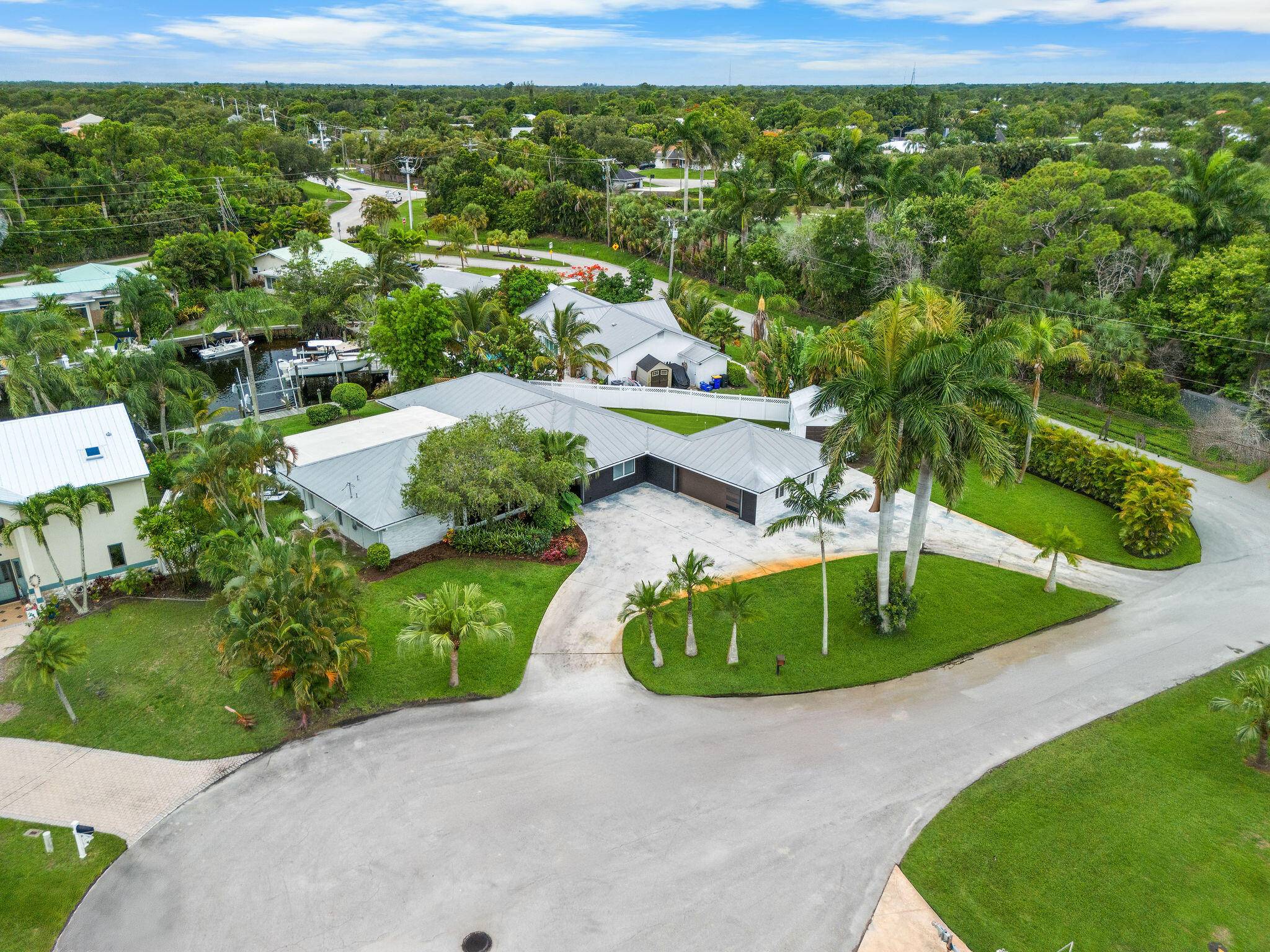 Experience True Florida living at this completely renovated Seagate Harbor home !