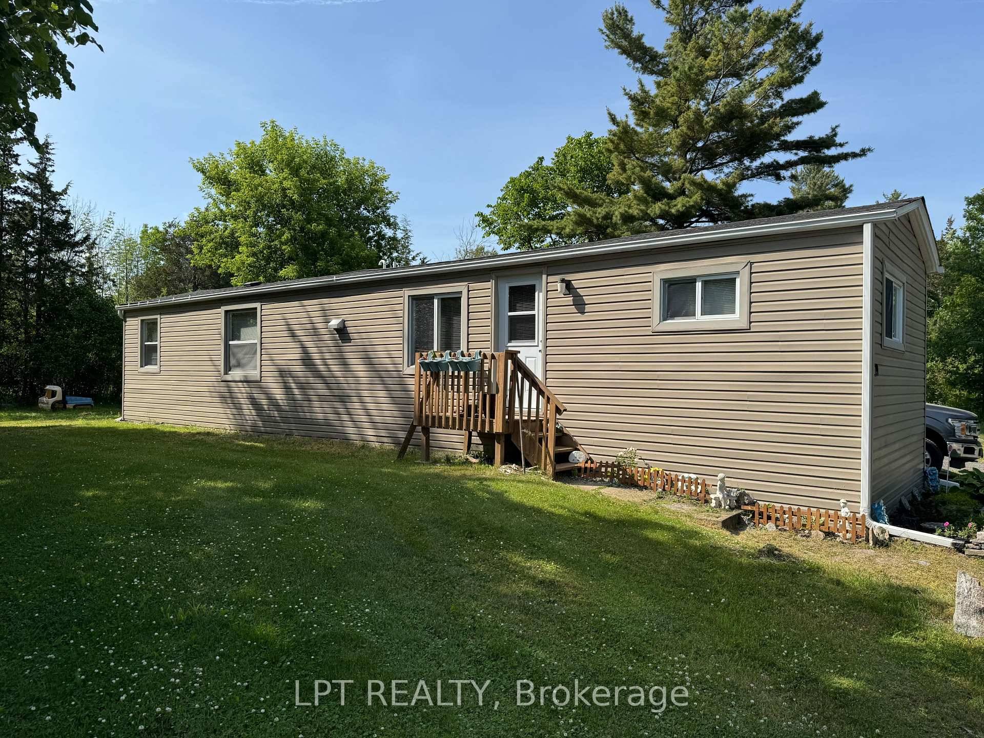 Discover this delightful 2 bedroom, 2 bathroom mobile home that perfectly marries modern updates with cozy charm.