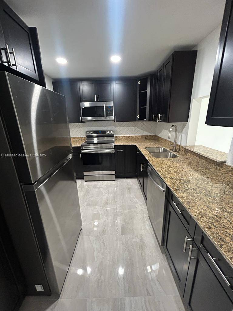 Beautifully remodeled 2 bedroom, 2 bath condo located in the heart of Deerfield Beach.