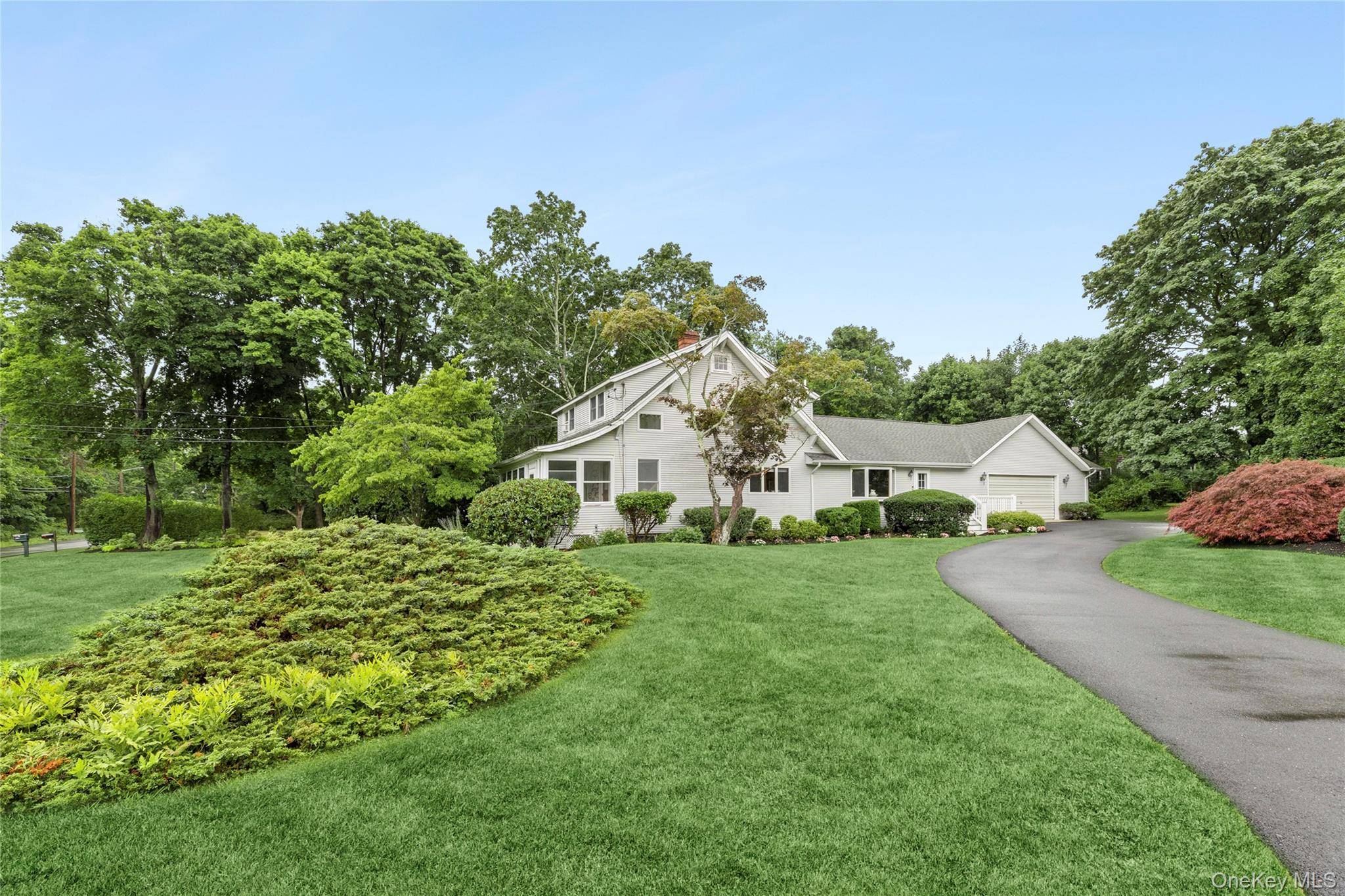 Welcome to 2725 Skunk Lane, a beautiful home nestled in the heart of Cutchogue NY.