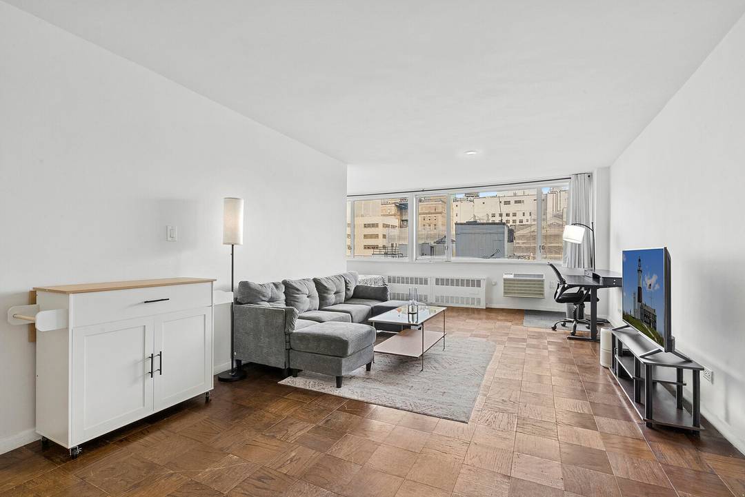 All offers Considered ! Perched on the 10th floor of a well maintained elevator co op, this bright studio offers open north facing skyline views through oversized windows that flood ...