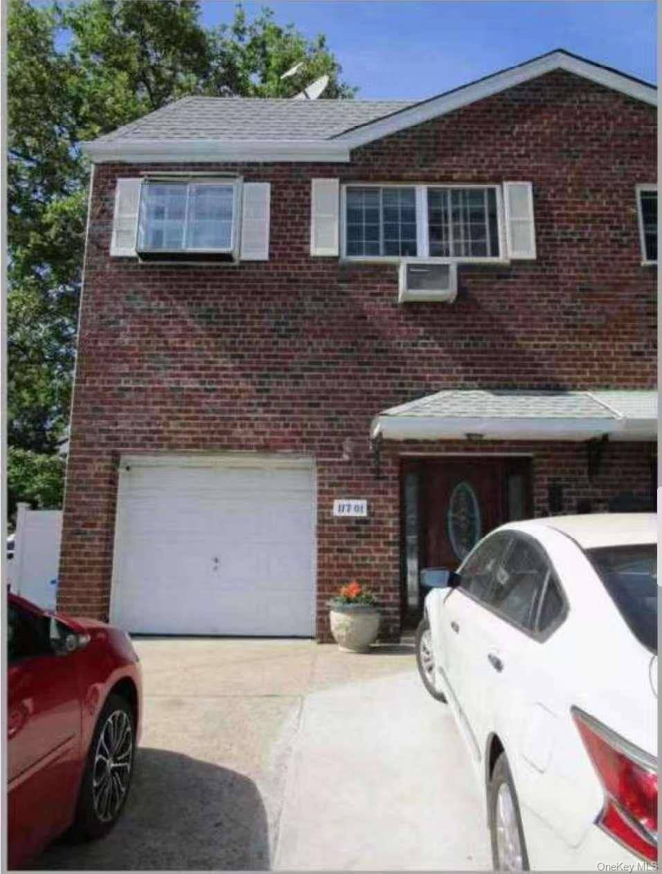 This is a 2 family brick house located in the heart of College Point.