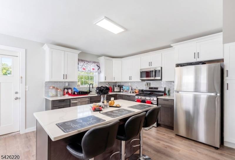 Welcome to beautiful three family home.