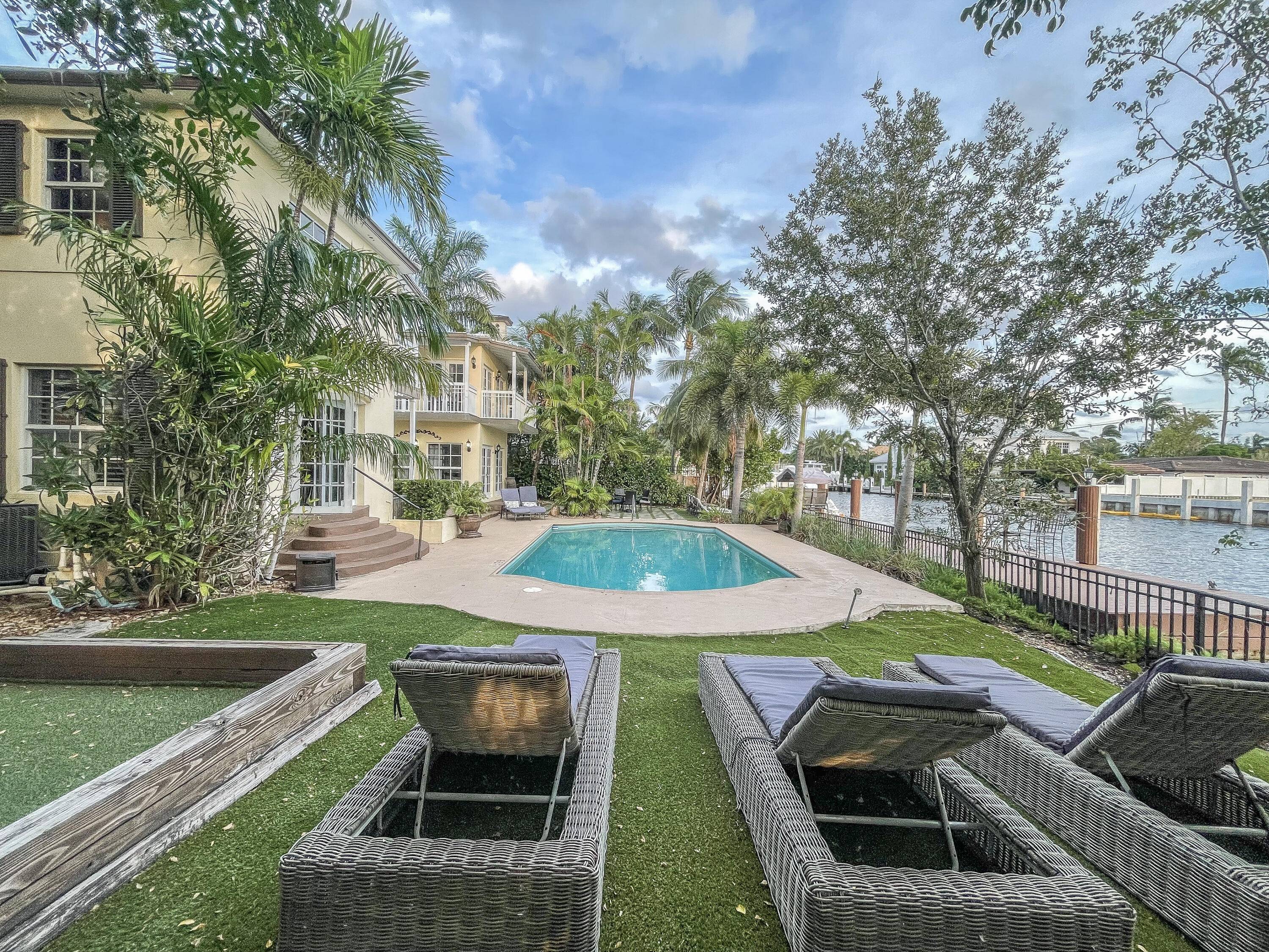 Nestled in the iconic Seven Isles, this exquisite 6 bedroom, 5.