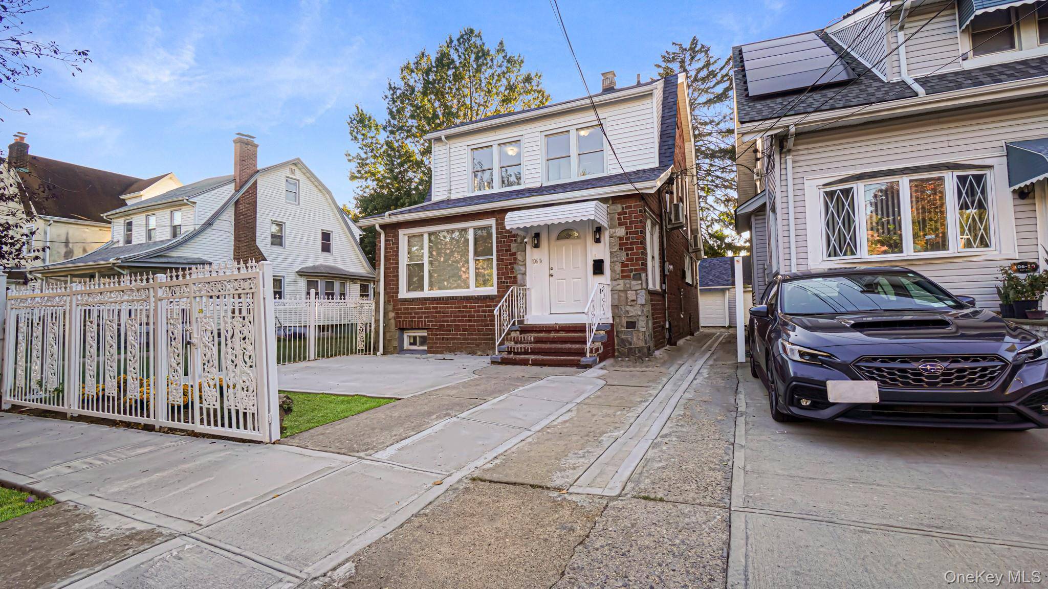 Welcome to this beautifully renovated brick single family home in the heart of Queens Village !