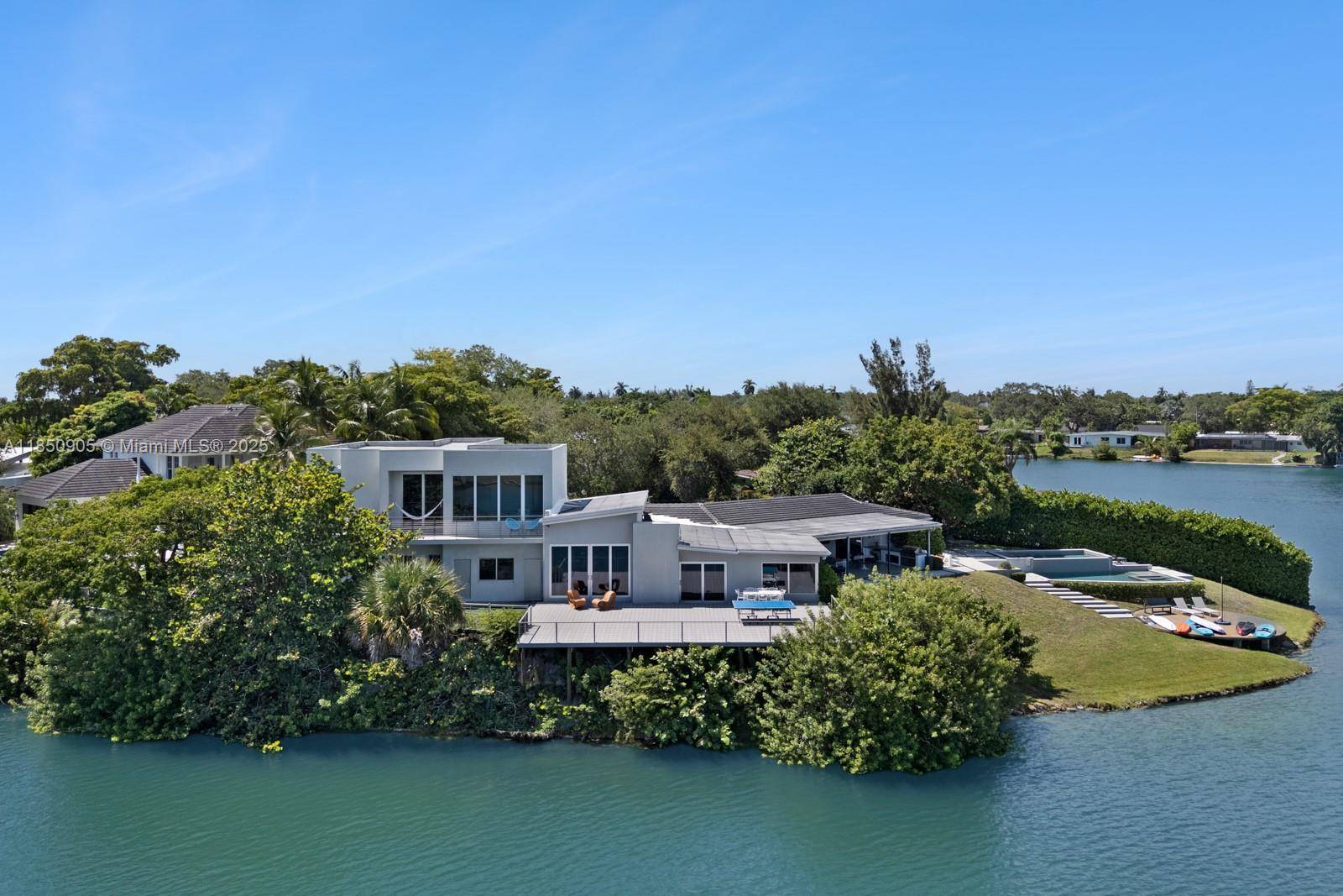 New construction lakefront estate on 13, 300 SF island on a private cul de sac !