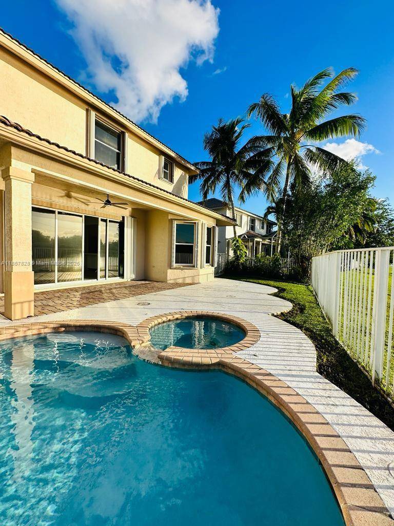 Beautiful REMODELED 6 bedrooms, 5 bathrooms and 4 car garage house located at the prestigious community of Weston Hills Country Club.