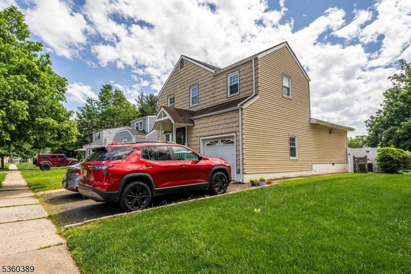 Your Dream Home Awaits ! This charming colonial single family home boasts four spacious bedrooms and two full bathrooms, perfect for those seeking ample space.