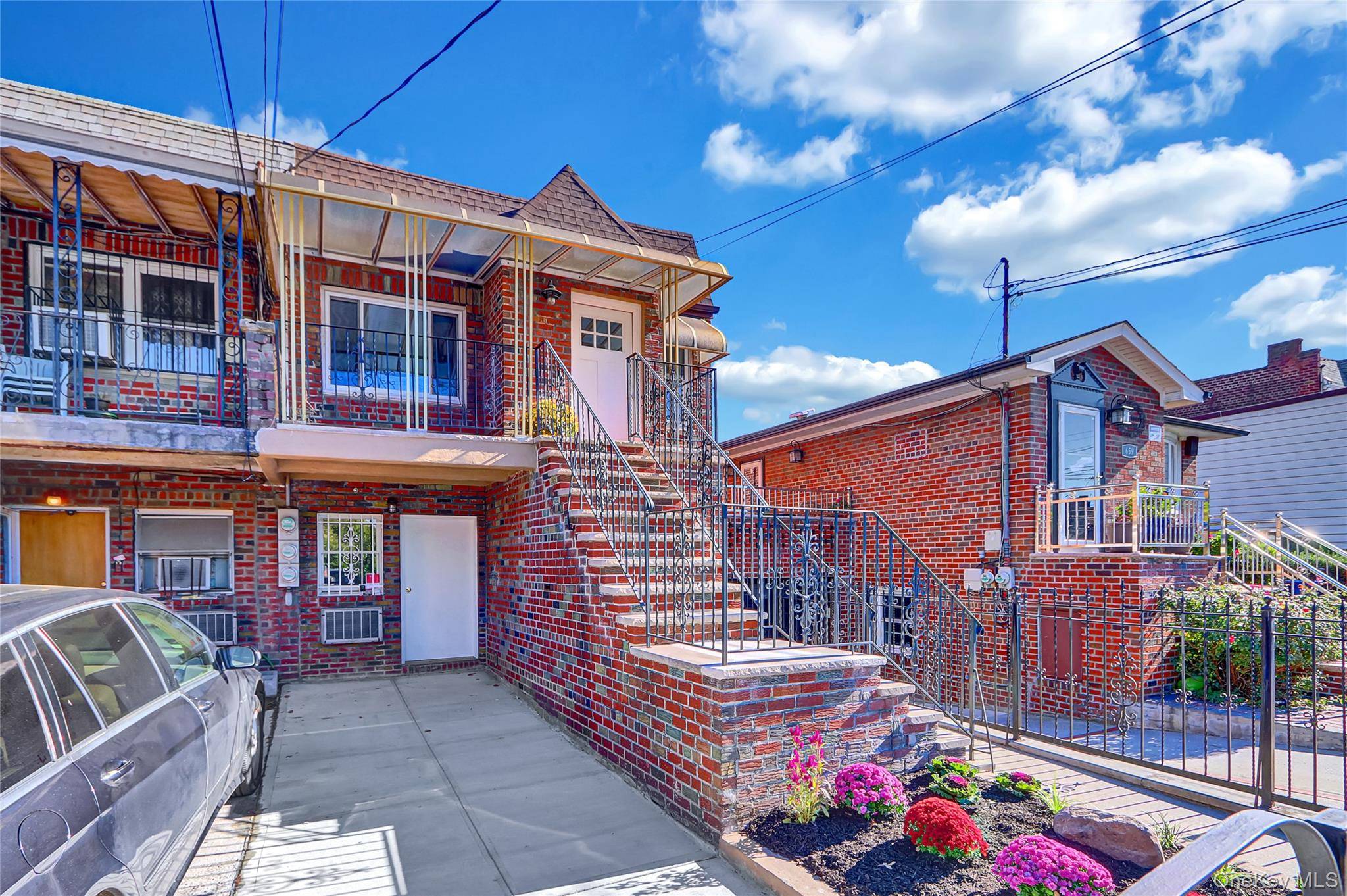 Absolutely stunning and spectacular two family masterpiece with beautiful kitchens, bathrooms, new roof, gorgeous flooring, off street parking, and a fantastic walk out basement that leads to a wonderfully fenced ...