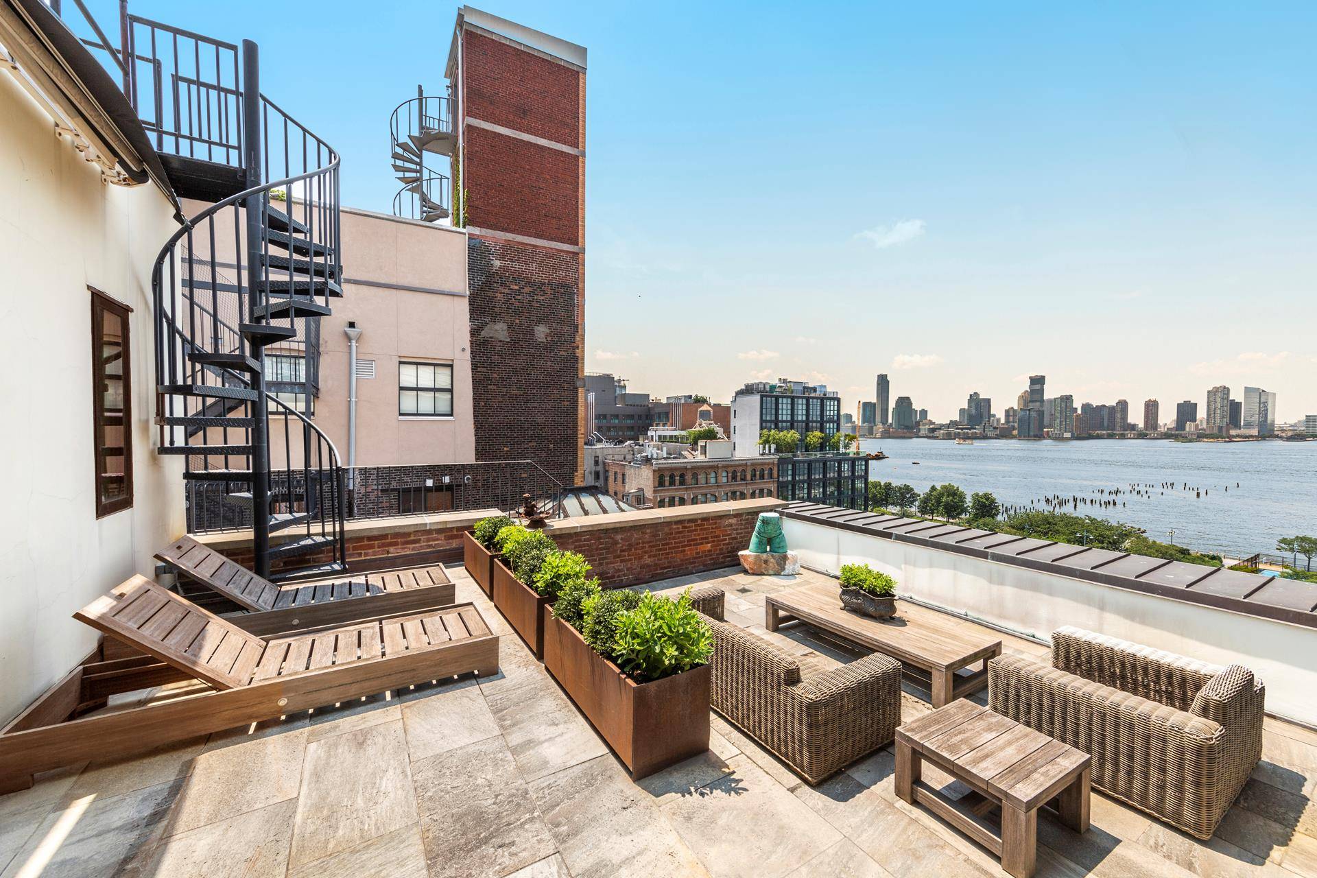 Glamourous Penthouse with perfect river views from all rooms, including the lavish terrace overlooking the water.
