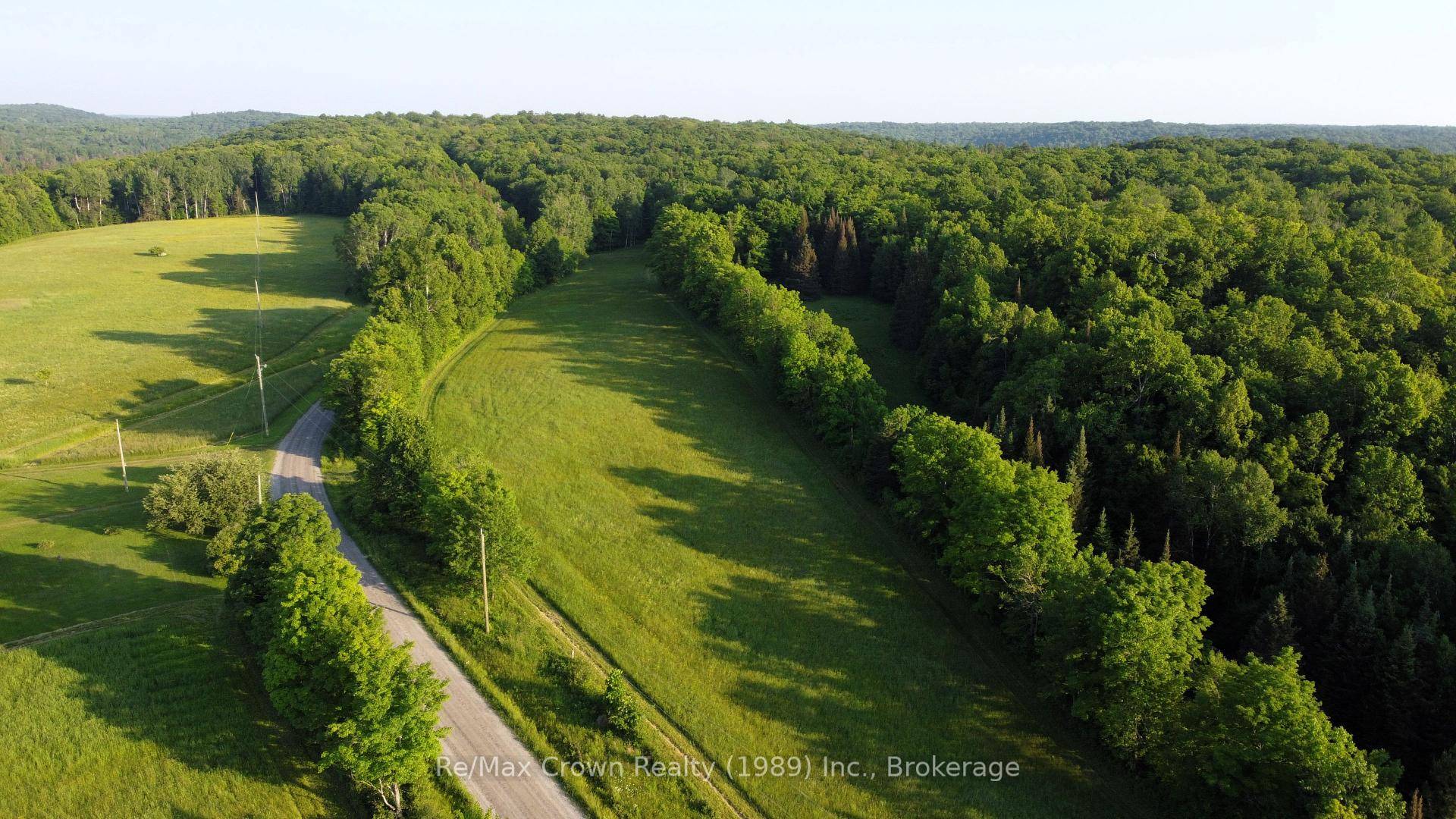 50 acres of beautiful, versatile land zoned rural, offering some field area but mostly wooded with predominantly maple trees.