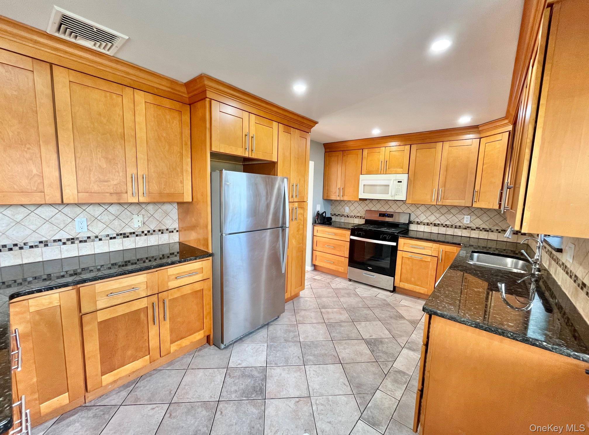 Beautifully Renovated 3 Bedroom Apartment On 1st Floor of Private Home Located In Yonkers.