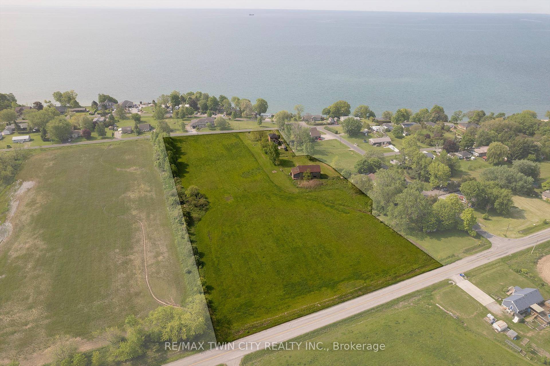Rare approx. 6. 5 acre hobby farm next to the Vaughn survey and steps to the water with spectacular Lake Erie views from the top floor of the century home ...