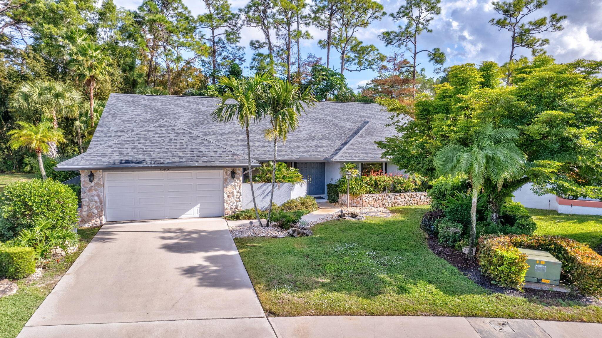 New Roof ! Nestled in a tranquil cul de sac, this stunning pool home offers the perfect blend of comfort and convenience in the heart of Wellington.