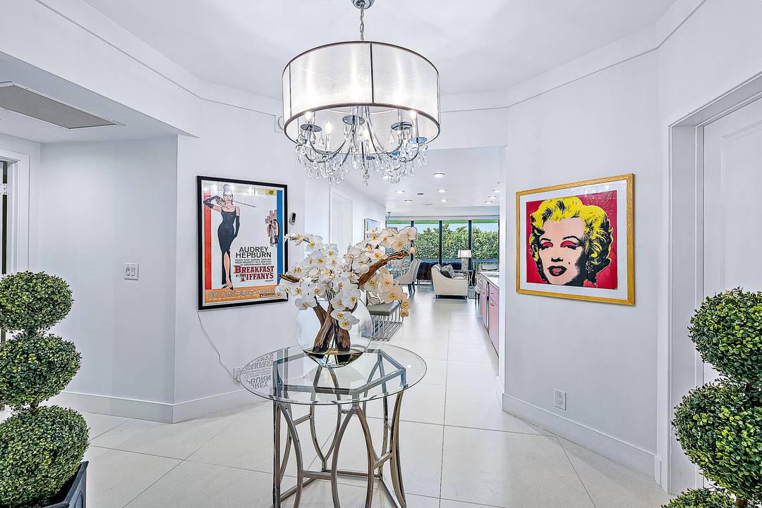 This sophisticated 2, 600 SF residence at Sloan's Curve offers coveted southern exposure and ocean views.