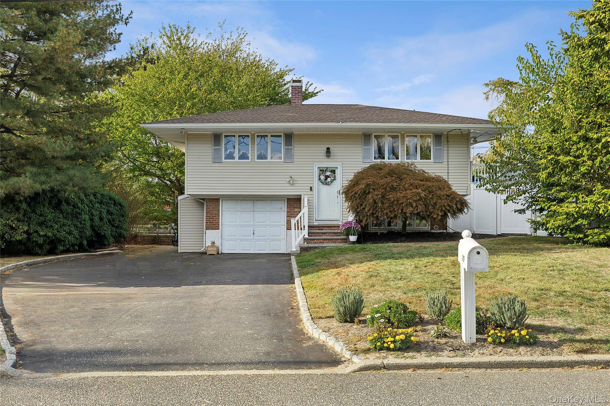 Beautiful Hi Ranch style home set on corner 0.