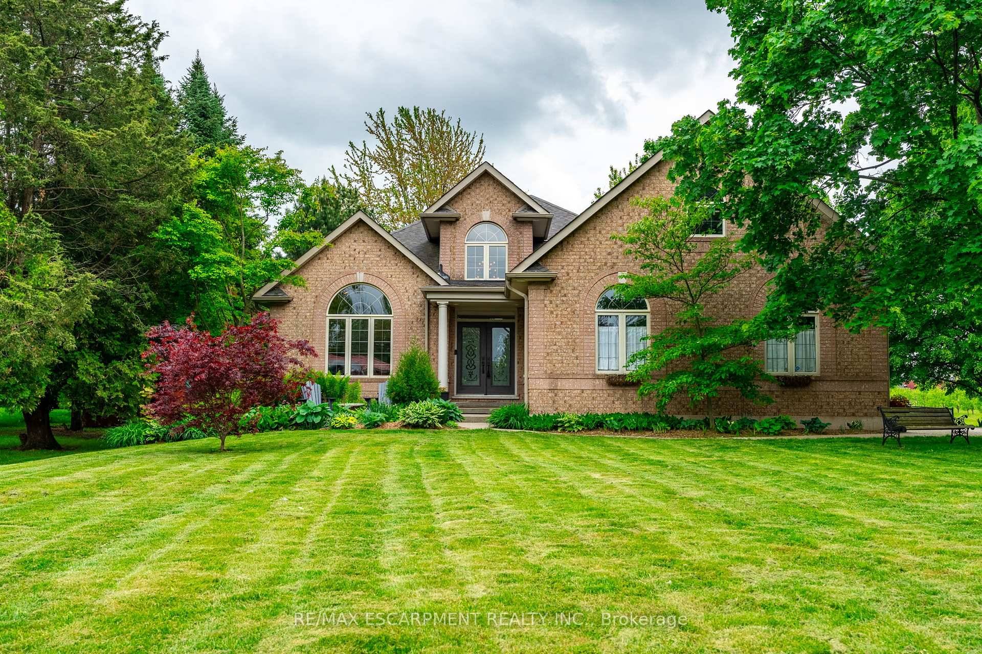 Discover the perfect blend of country charm and modern convenience in this stunning open concept home set on a generous half acre lot.