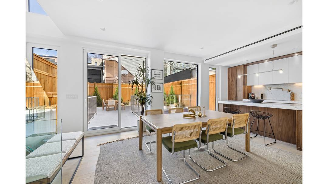 This townhouse inspired home is an expansive three level garden residence thoughtfully designed to balance openness with privacy, offering a seamless distinction between living, entertaining, and restful spaces.