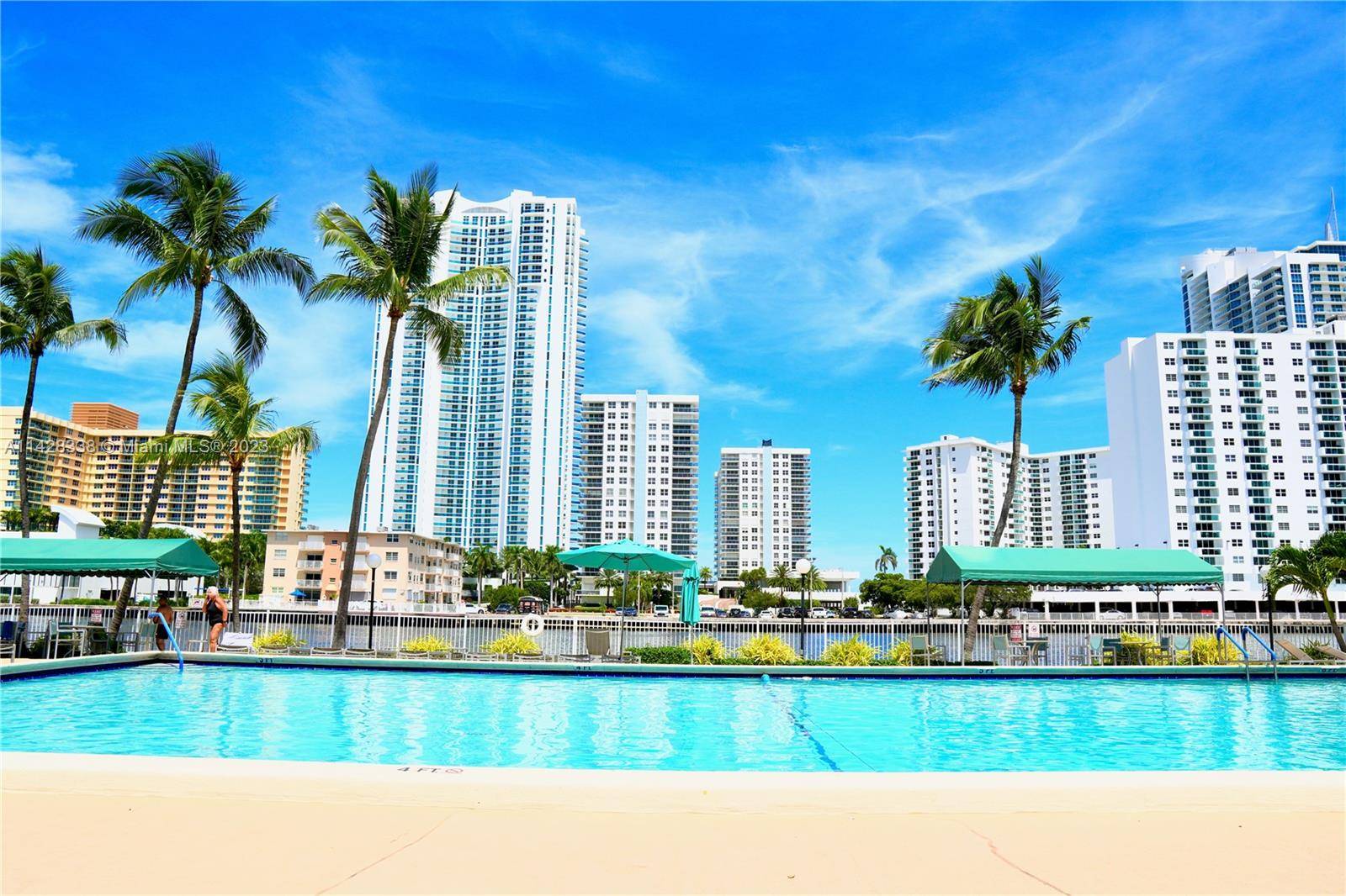 WELCOME TO THIS STUNNING 3 B R, 2, B A RENOVATED CORNER CONDO, IDEALLY SITUATED JUST A SHORT WALK AWAY FROM THE PRISTINE BEACHES OF HALLANDALE !