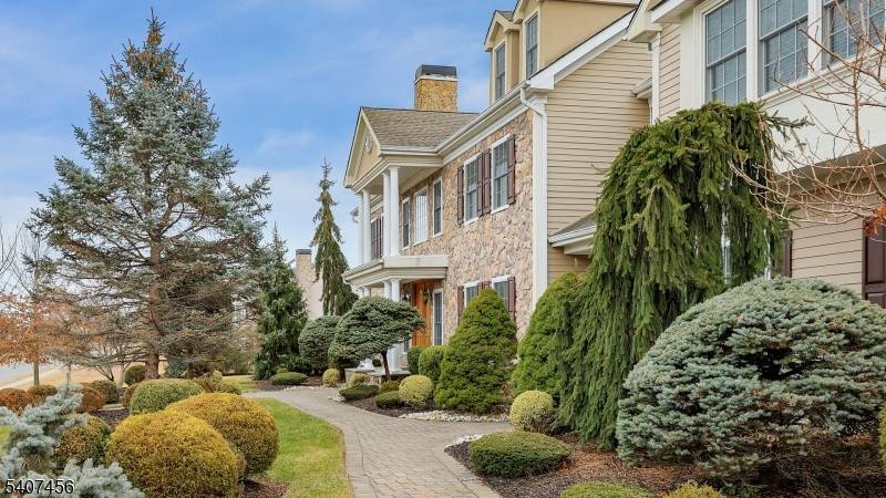 North Edison home nestled on a quiet cul de sac in this luxurious custom built estate blends timeless craftsmanship with elegant design and exceptional functionality.