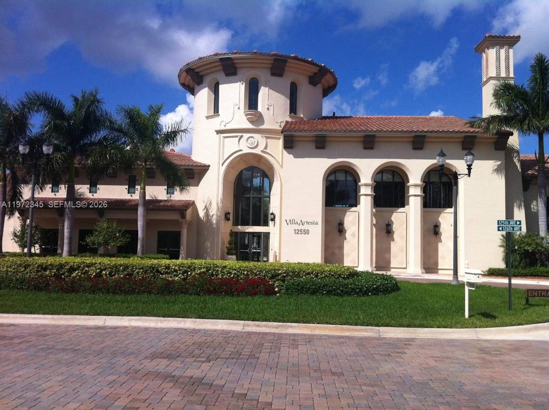 Located in the resort style community of Artesia in the heart of Sunrise, this beautifully remodeled Portico Model offers 3 bedrooms and 2.