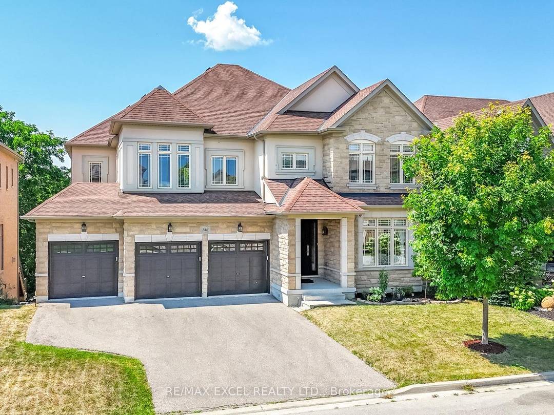 This exceptional 5 2 bedroom, 5 bath executive residence offers over 7, 000 sq ft of total living space on a premium ravine lot with a finished walk out basement.