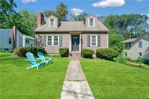 Just steps from the association beach on Lake Pocotopaug, this beautifully remodeled cape style home on private street with lake access, 75 ft dock with a available boat slip !