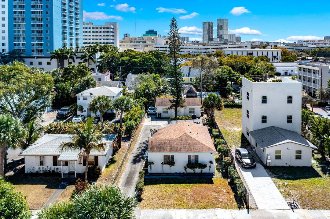 PHENOMENAL LOCATION AND GREAT OPPORTUNITY to own this property with House and Duplex on Double Lot.