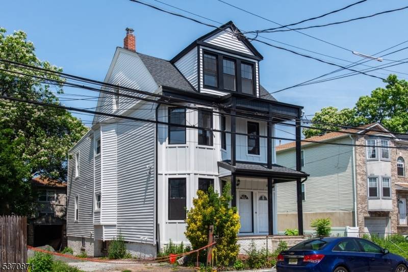Completely renovated 3 family home in Newark !