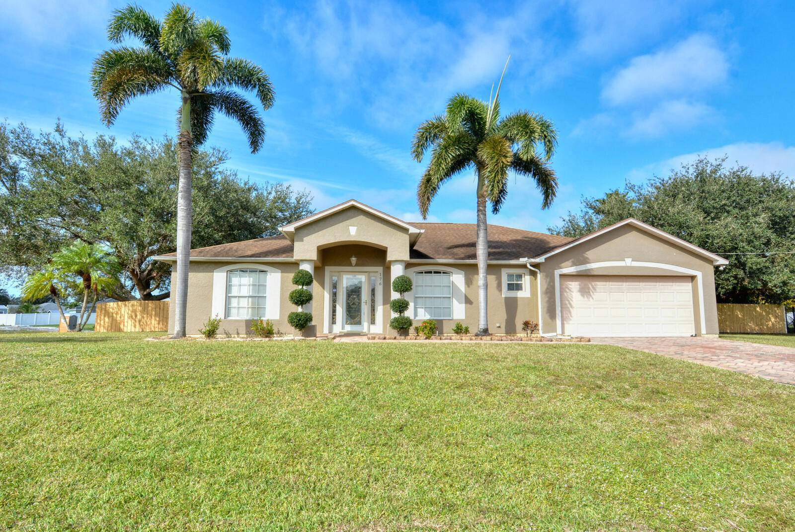 Check out this three bedroom, two bath pool home on a corner estate lot with over a half acre of land and a new fenced back yard.