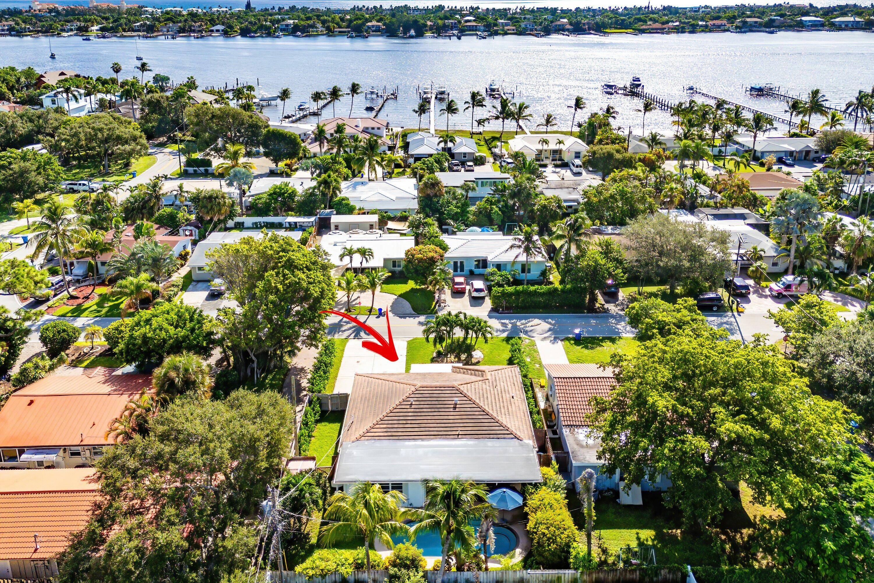 Welcome to this beautifully updated and meticulously maintained 3 bedroom, 2 bathroom pool home with a 1 car garage and extended driveway, perfectly situated just one block from the Intracoastal ...