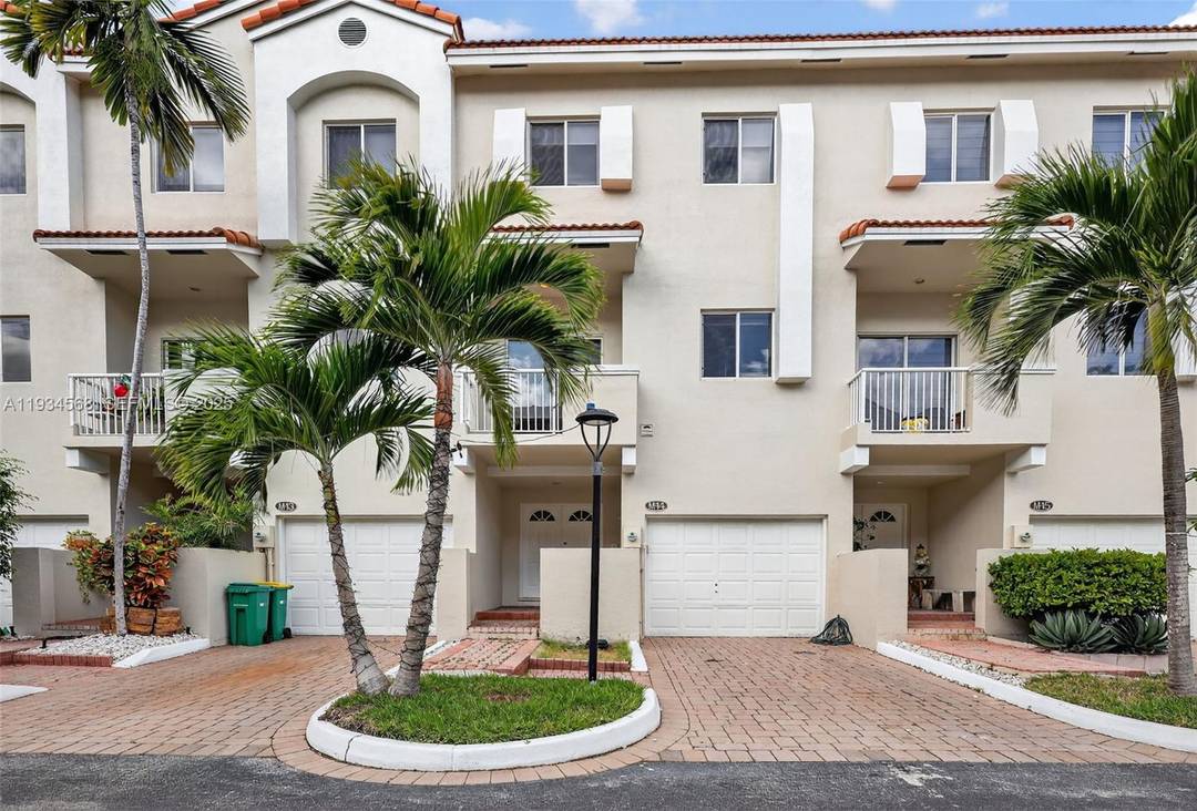 Stunning 3 story luxury townhome in an exclusive gated waterfront community in the heart of Aventura.