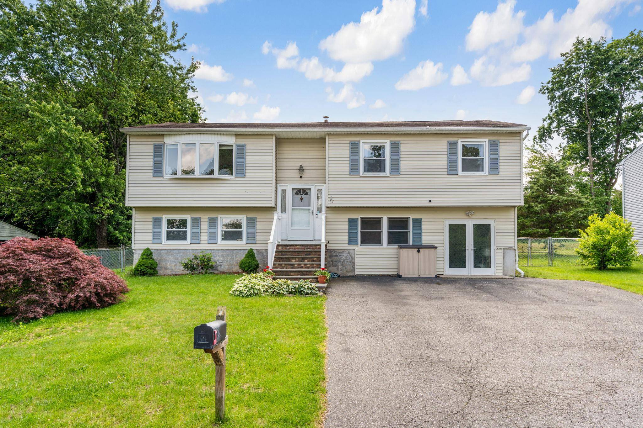 Just Listed for Summer ! Spacious 6 Bedroom Gem with Mother Daughter Potential in a Charming Neighborhood !