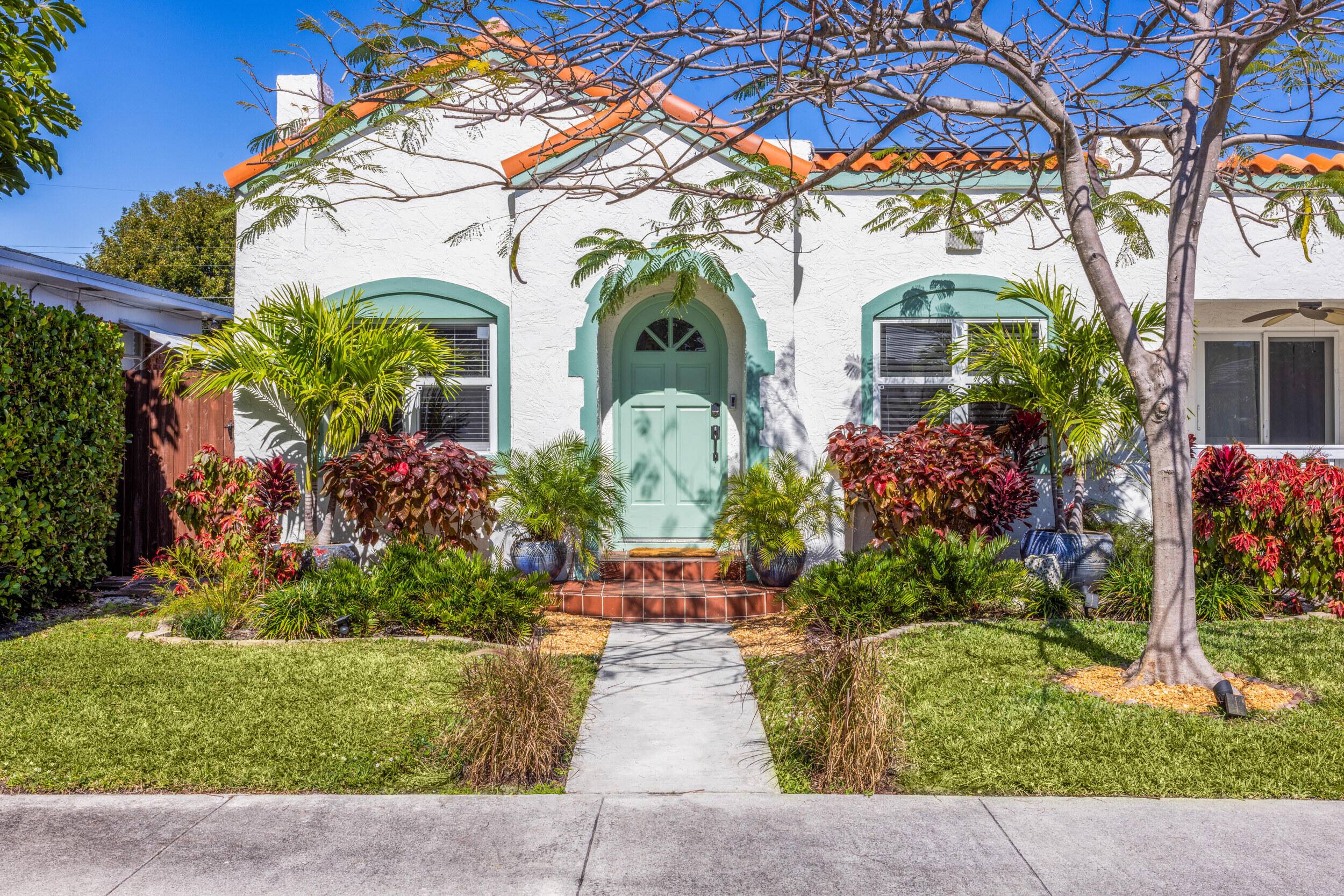Charming Spanish style beach bungalow with guest house and saltwater pool.