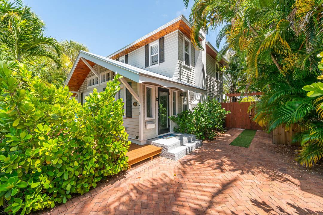 Exceptional Key West style home with 5 bedrooms, 4.