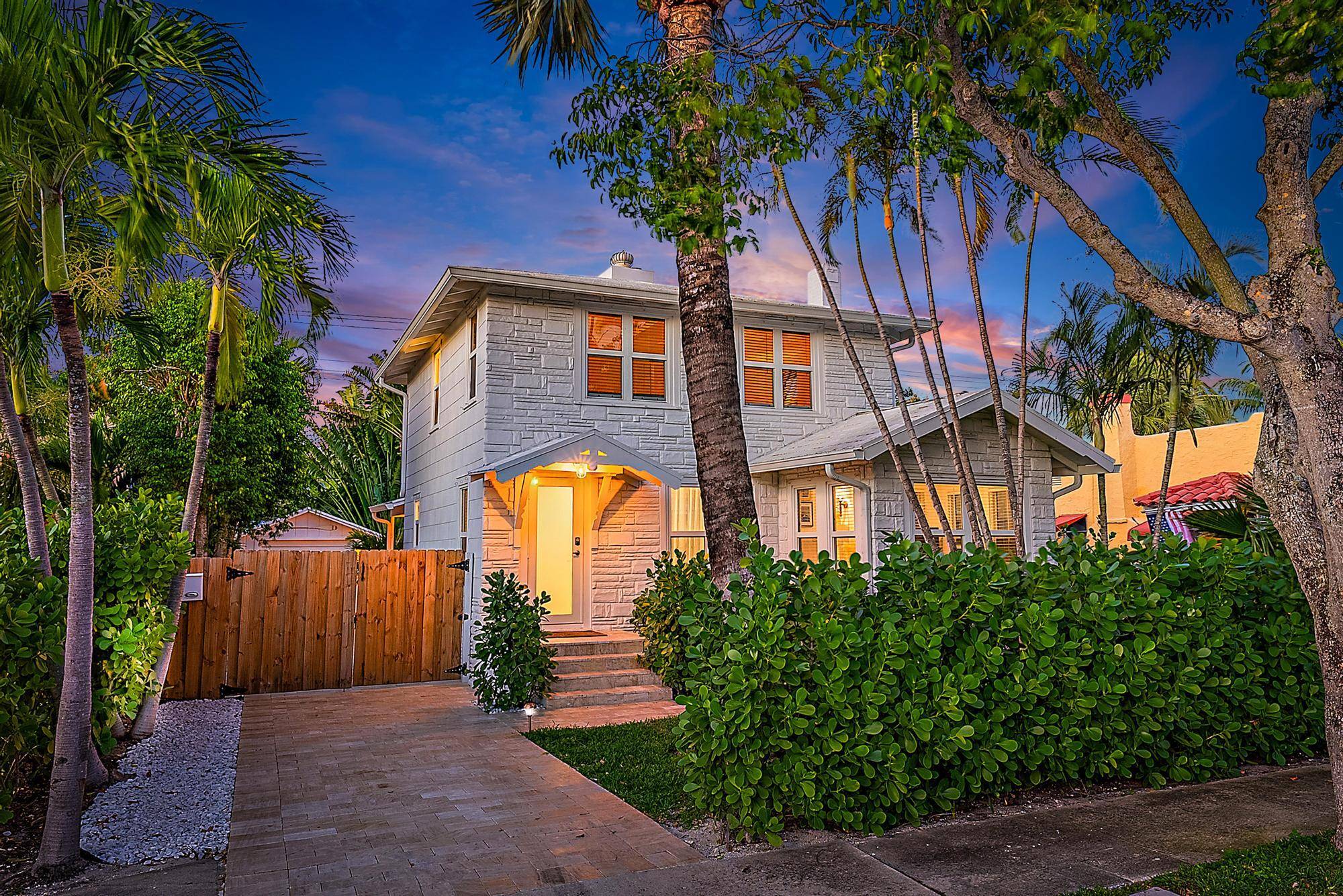 Welcome to 231 Walton Blvd, a meticulously renovated 2 story residence nestled in the heart of WPB's Central Park Historic District.
