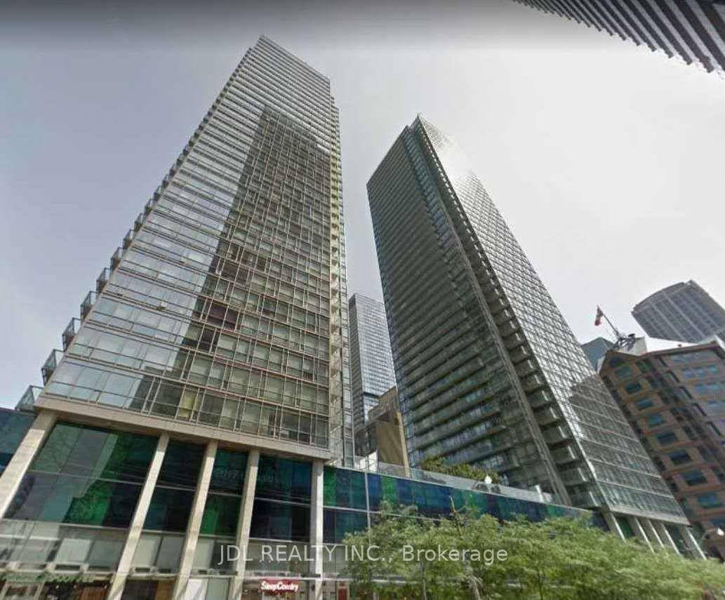 Don't miss out on this stunning corner unit in the luxurious Burano on Bay Street, featuring an excellent layout with a spacious living area, two bedrooms, and a den and ...