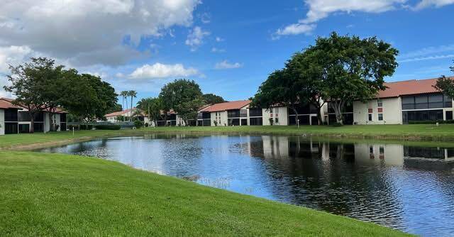 MOTIVATED SELLER ! ! ! Home sits on the lake w east exposure beautiful updated white kitchen w granite w private BBQ patio off kitchen.