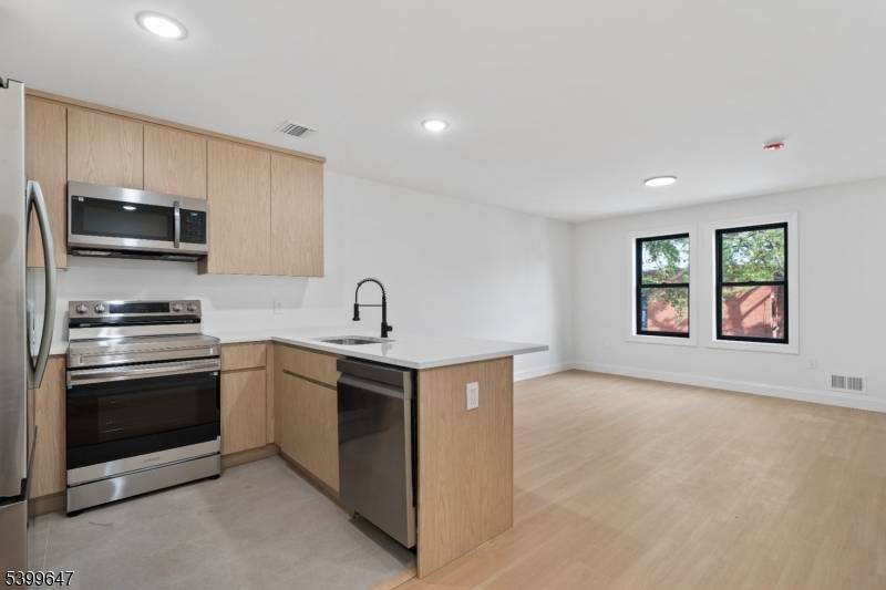 Introducing this brand new luxury 2 family home in South Paterson, offering a total of 6 bedrooms and 5 full bathrooms, including two identical units each featuring 3 bedrooms, 2 ...