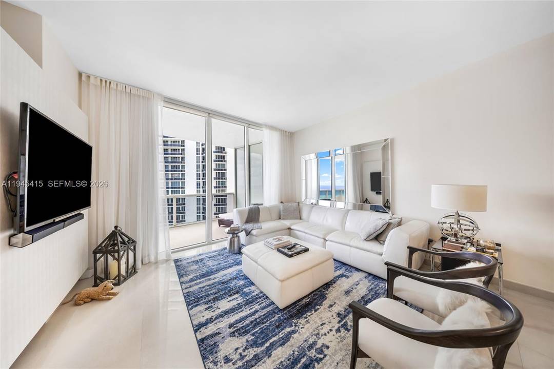 What an incredible 3 3 1 tastefully Fully Furnished with an amazing ocean view, just PRICED RIGHT at one of THE BEST buildings in Sunny Isles.