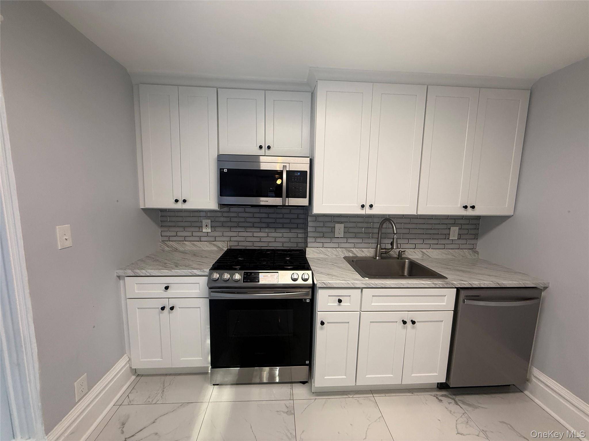 Welcome to this beautifully updated and fully renovated 3 bedroom, 1 bath apartment !