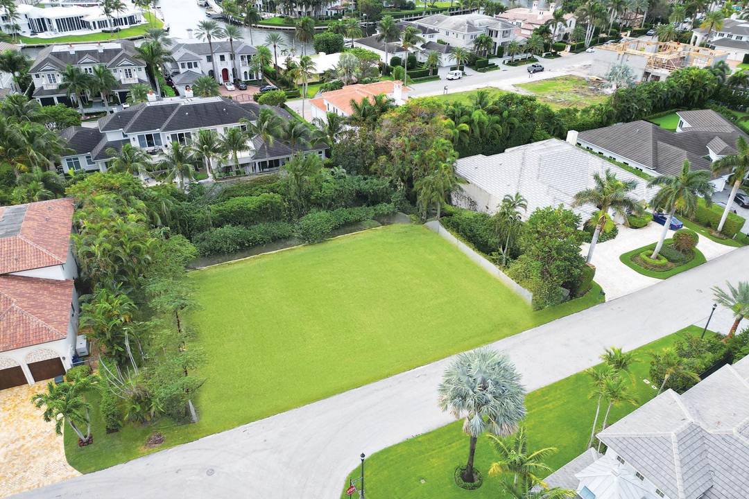 458 Areca Palm Road is located on a quiet street within Royal Palm Yacht Country Club on a lot and 2 3.