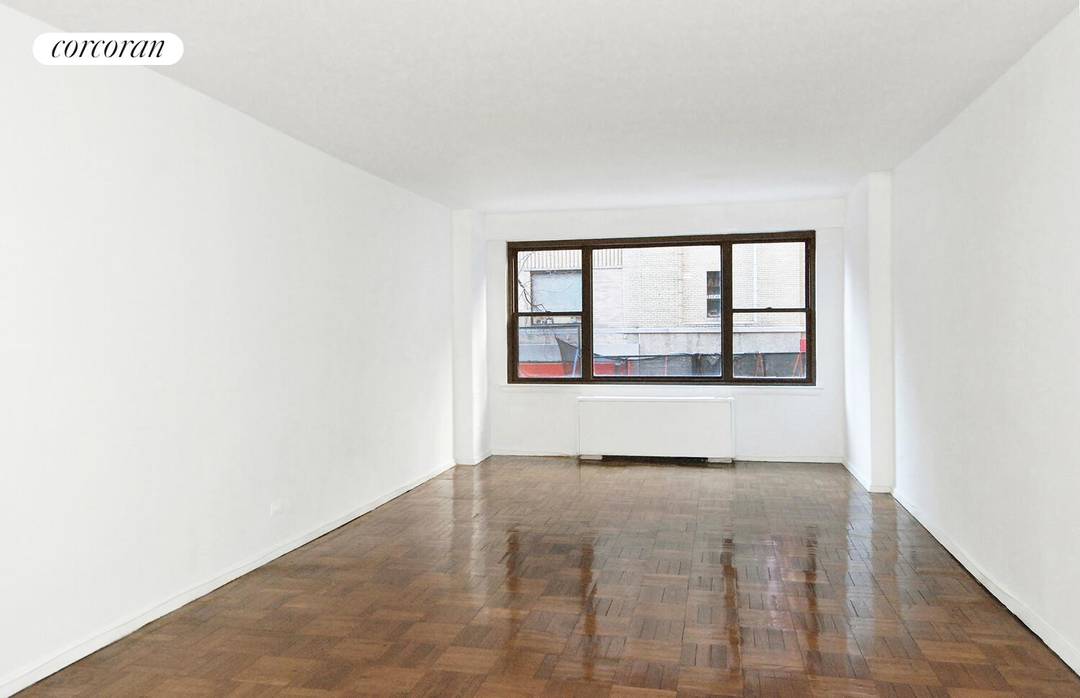 Attention Buyers NO BOARD APPROVAL for this large, south facing, corner 5 room residence, easily convertible to a three bedroom.