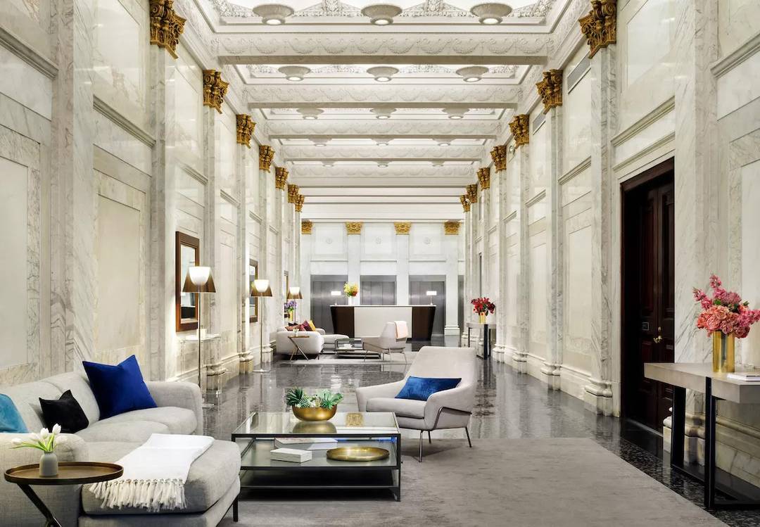 Luxurious Two Bedroom Two Bath Powder Room Condo Experience urban elegance at The Broad Exchange Building.