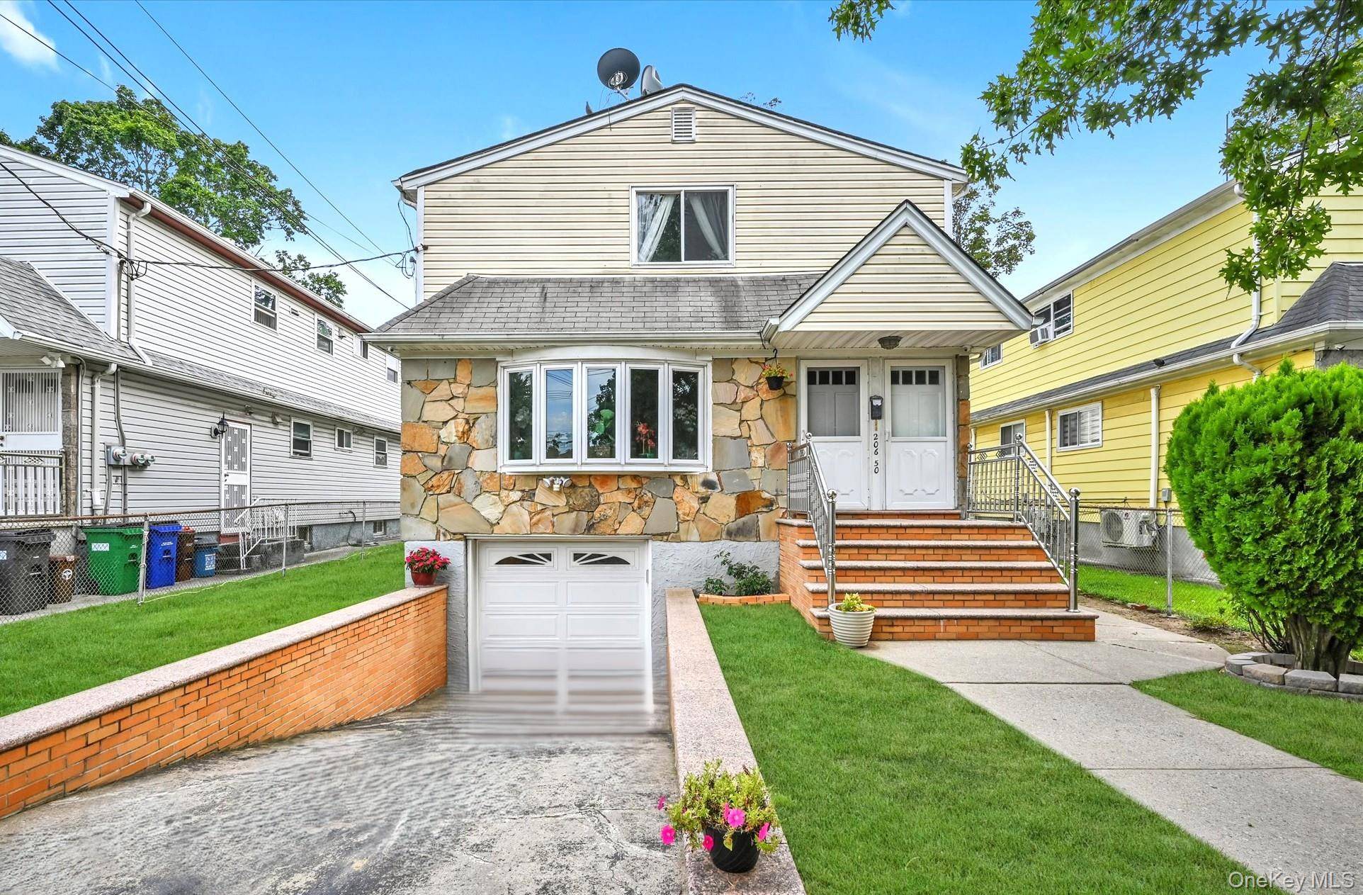 Welcome to this charming detached legal 2 family in the heart of Bayside !